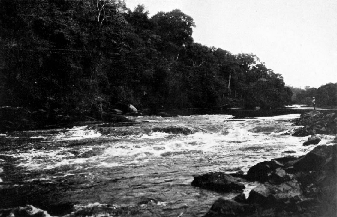 "The Witiston sula (rapid), in the distance Grandam." Verslag van een rijs naar Hendriktop by Gonggrijp & Stahel (1923).